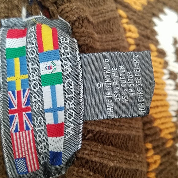 Geometric patterned sweater with a darj olive green backgound with earth tones. - Picture 3 of 3